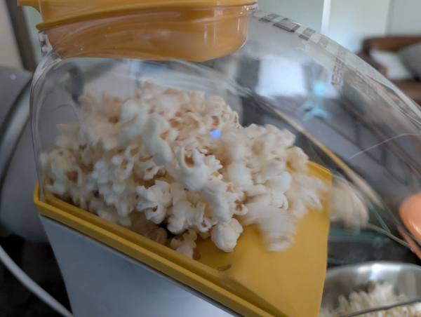 Popcorn popping in an air popper.